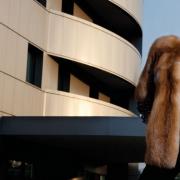 How did we manage to buy a fur coat on our own in Kastoria while vacationing in Sanaa?